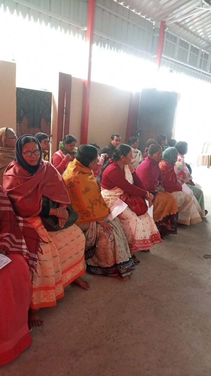 A medical camp: people gathered as doctors and volunteers attend to them